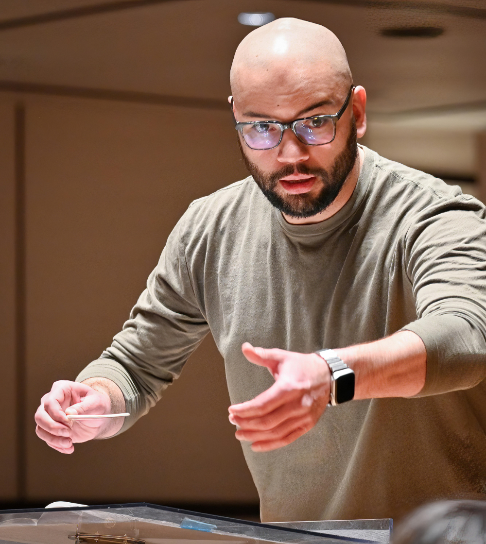 Neal conducting in rehearsal